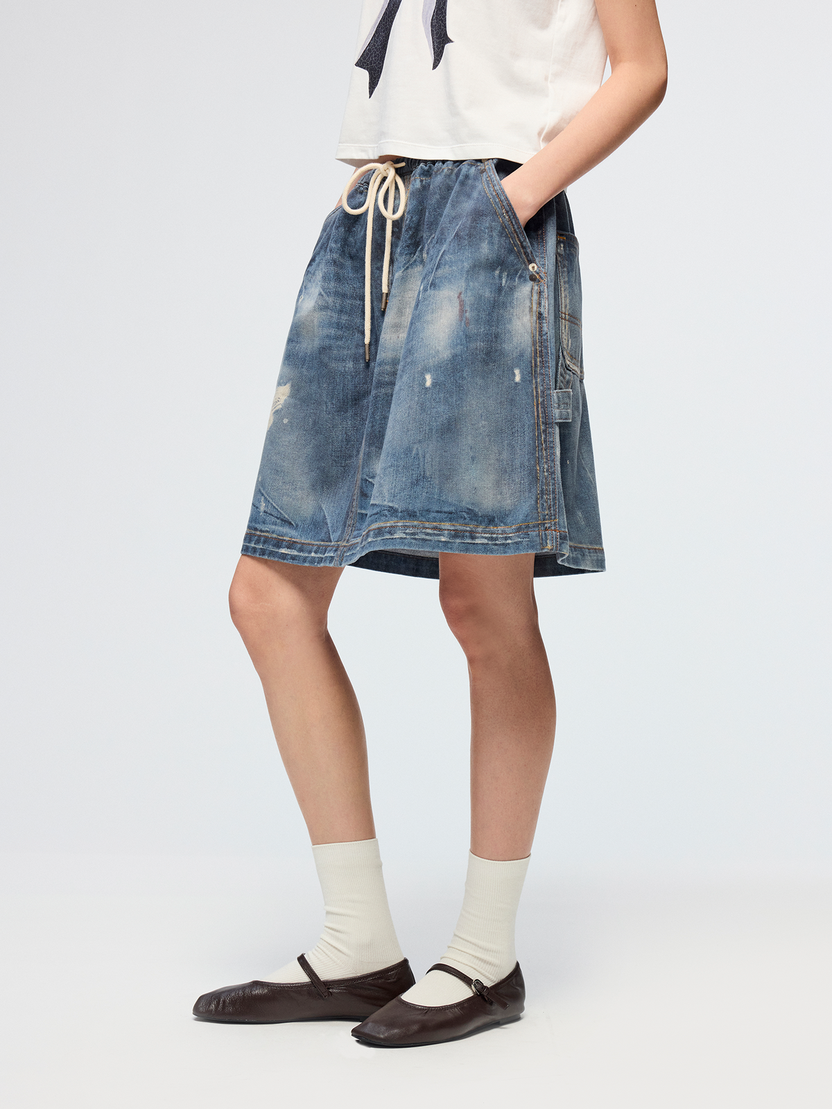 Surreal optical illusion denim mini skirt