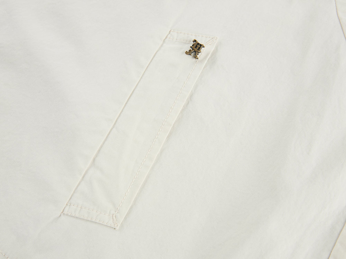 Exposed lining cropped balmacaan coat