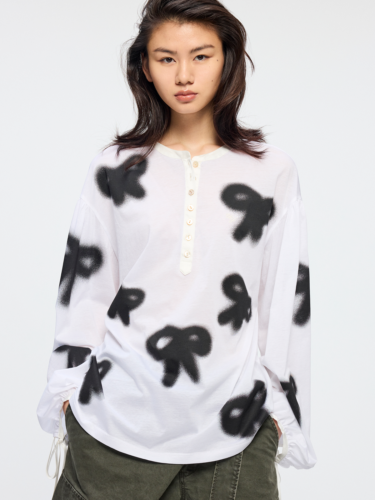 Graffiti bow henley T shirt