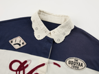 Applique badge Peter Pan collar polo