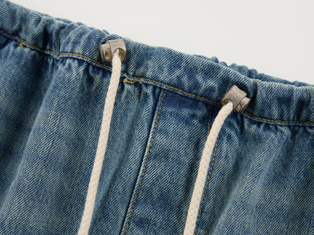 Distressed denim cargo skirt