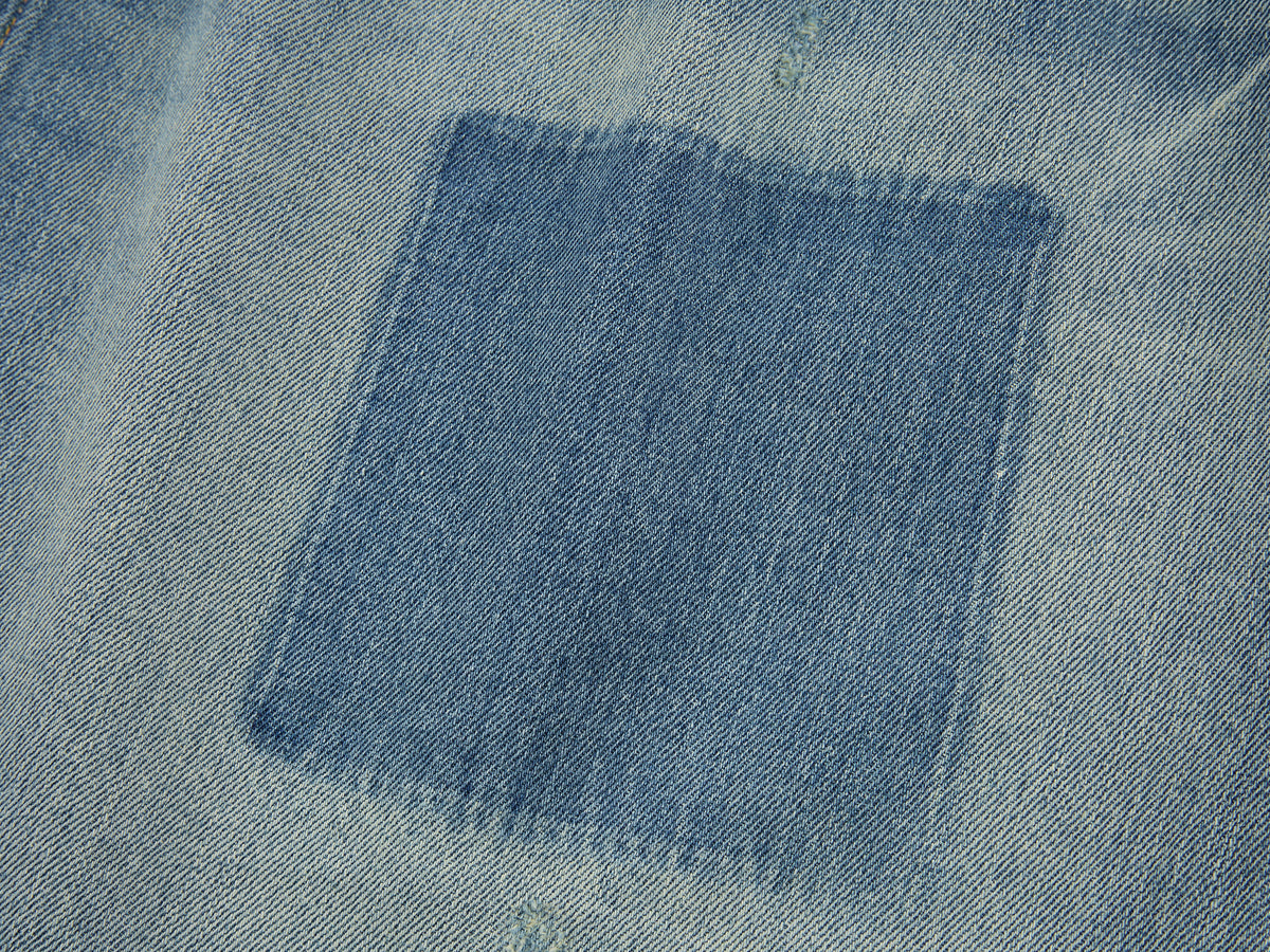 Distressed denim cargo skirt