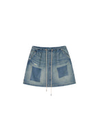 Distressed denim cargo skirt