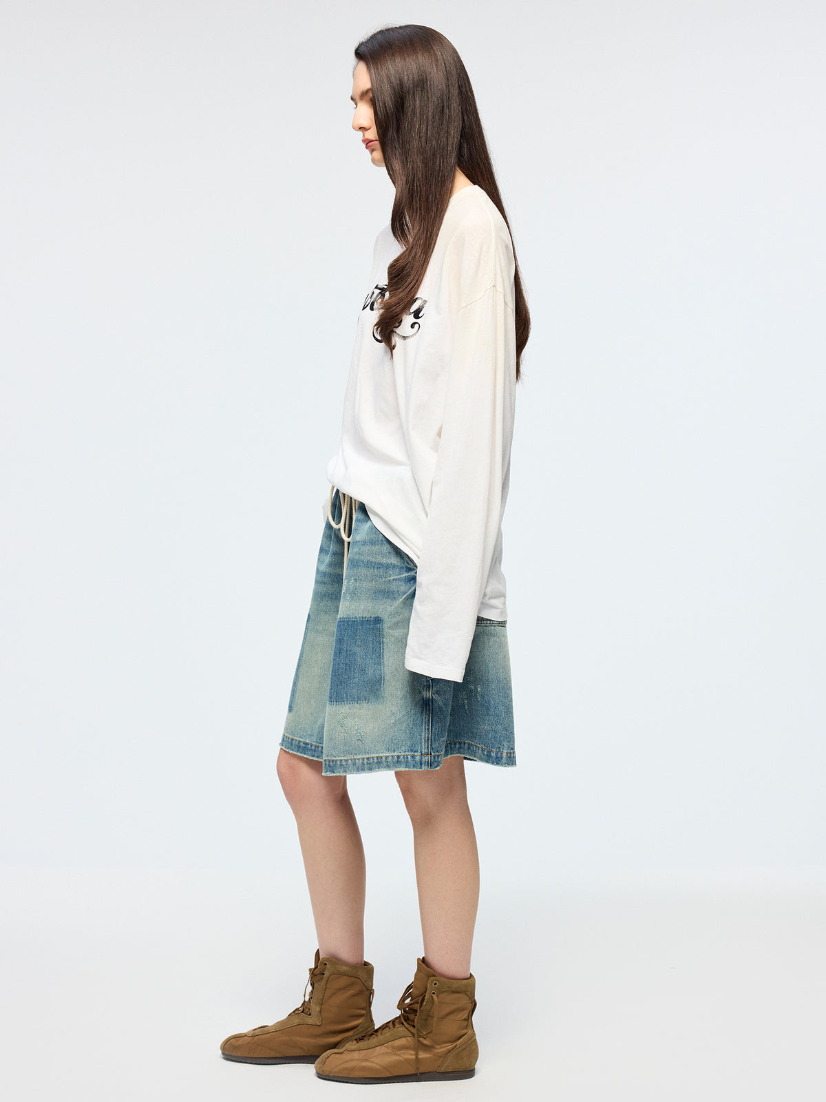 Distressed denim cargo skirt