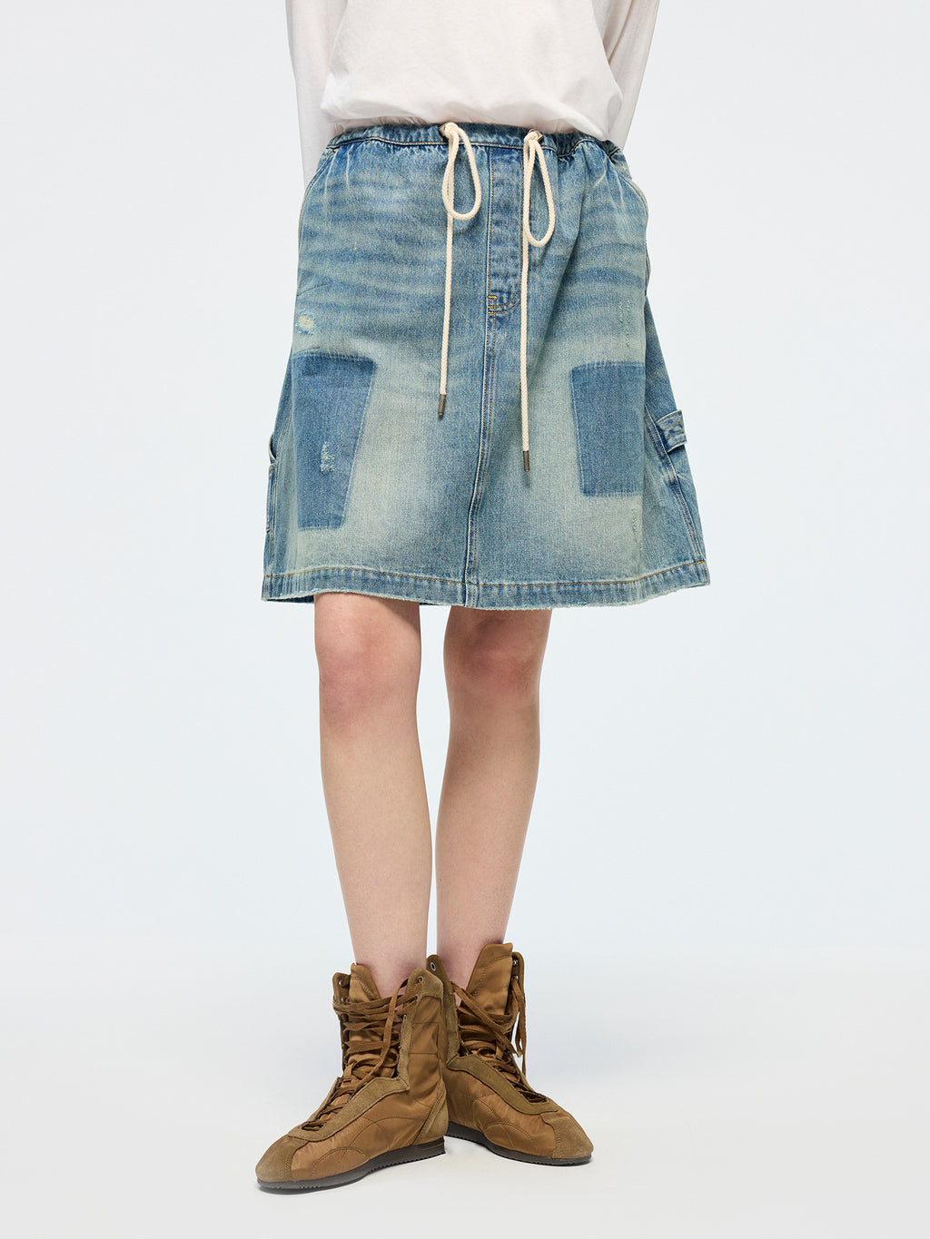 Distressed denim cargo skirt