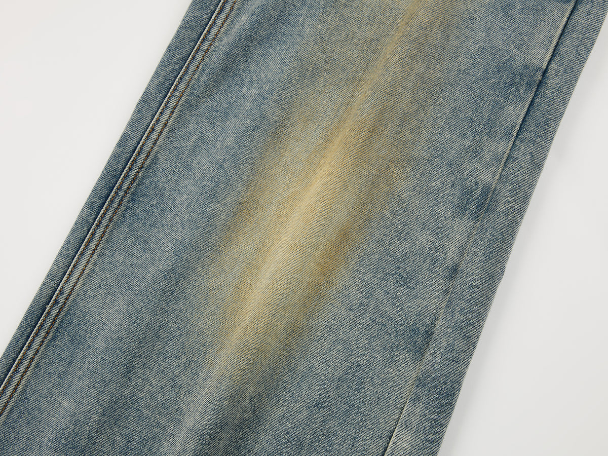 Washed dirty spray jeans