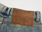 Washed dirty spray jeans