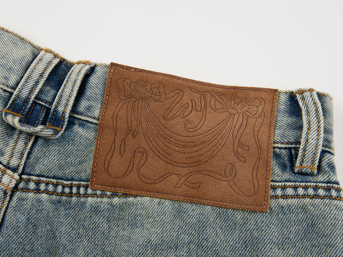 Washed dirty spray jeans
