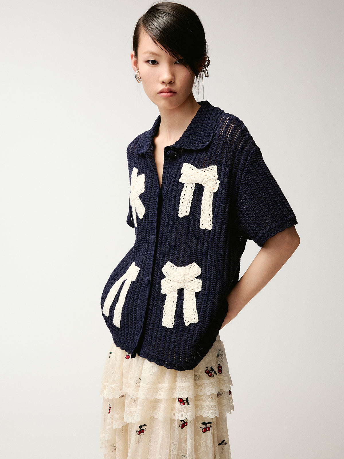 Handcrafted bow cardigan