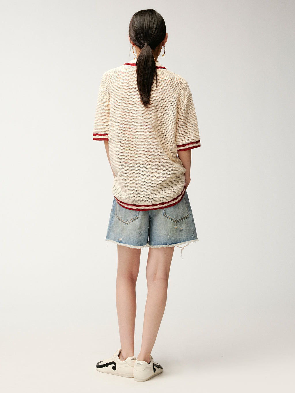 Pearl chain distressed denim shorts