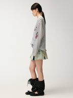 Washed pleated denim mini skirt