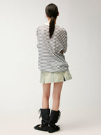 Washed pleated denim mini skirt