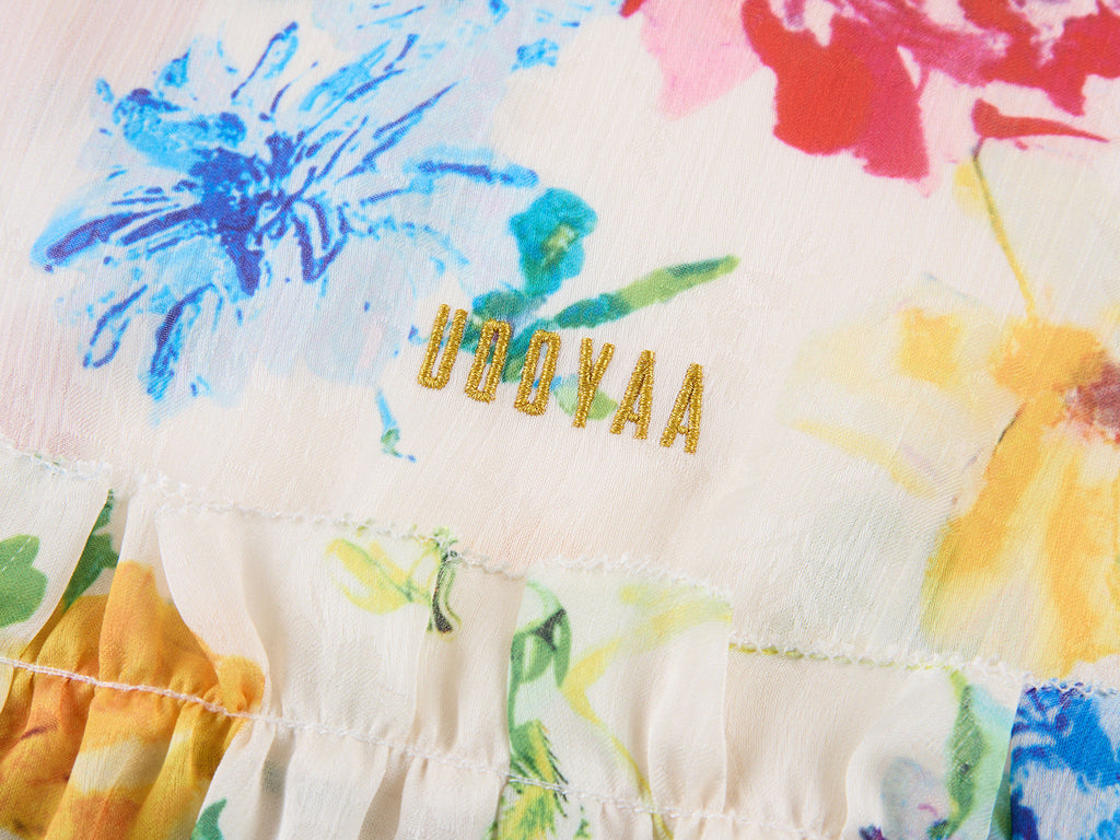 Floral ruffle and insect print vest