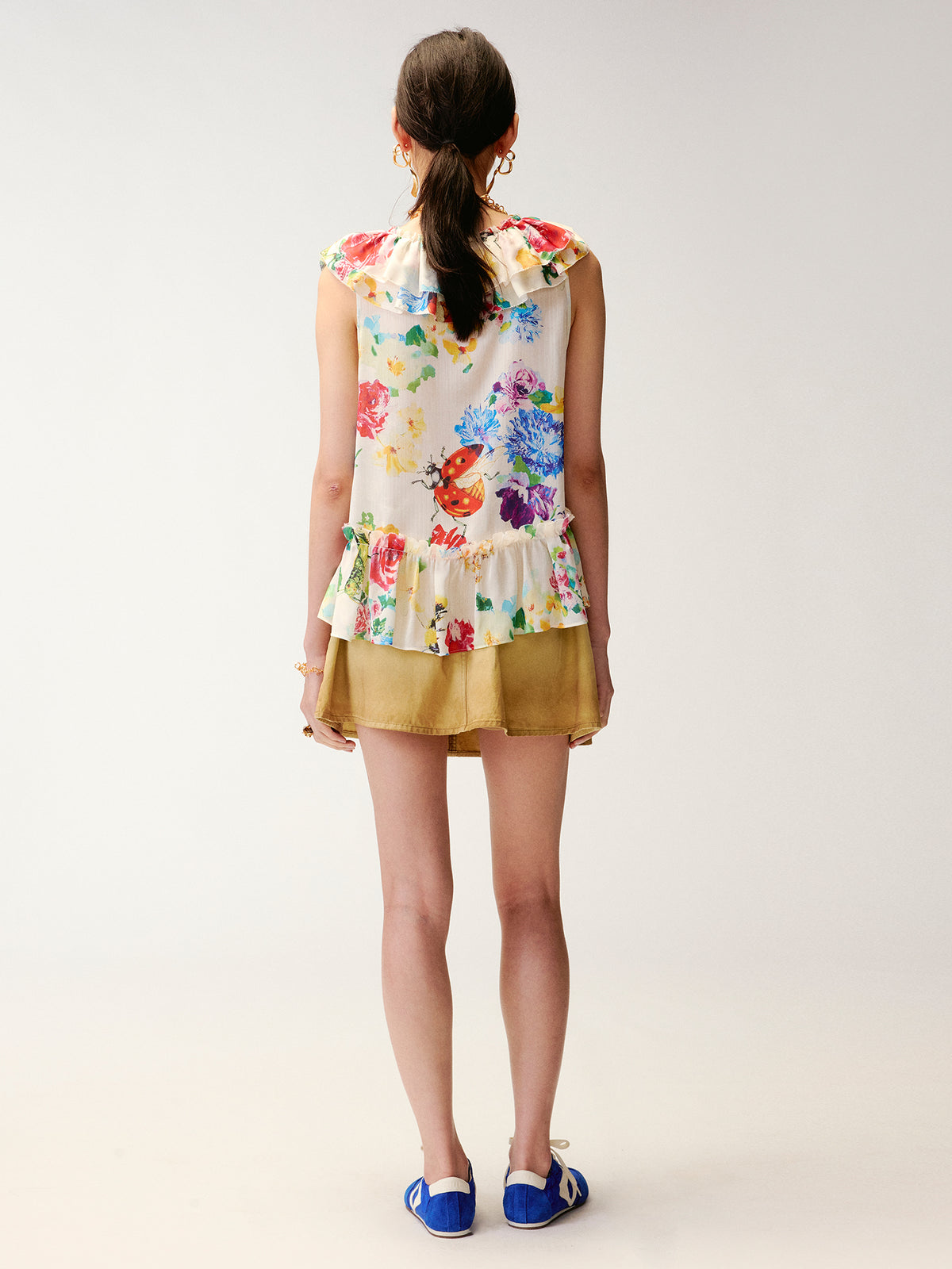 Floral ruffle and insect print vest