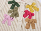 Hand-crocheted bow cardigan