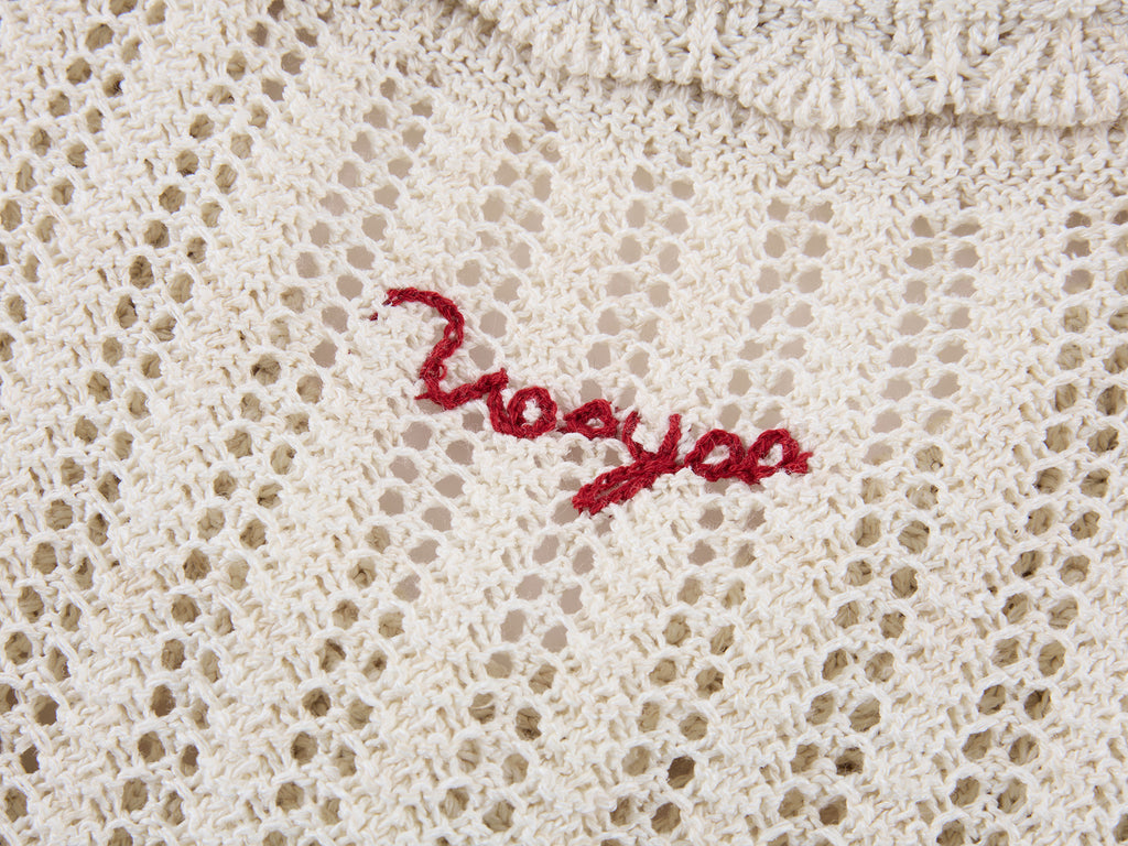 Hand-crocheted bow cardigan