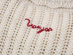 Hand-crocheted bow cardigan