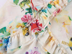 Floral and insect print suspender dress