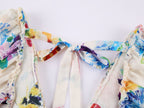 Floral and insect print suspender dress