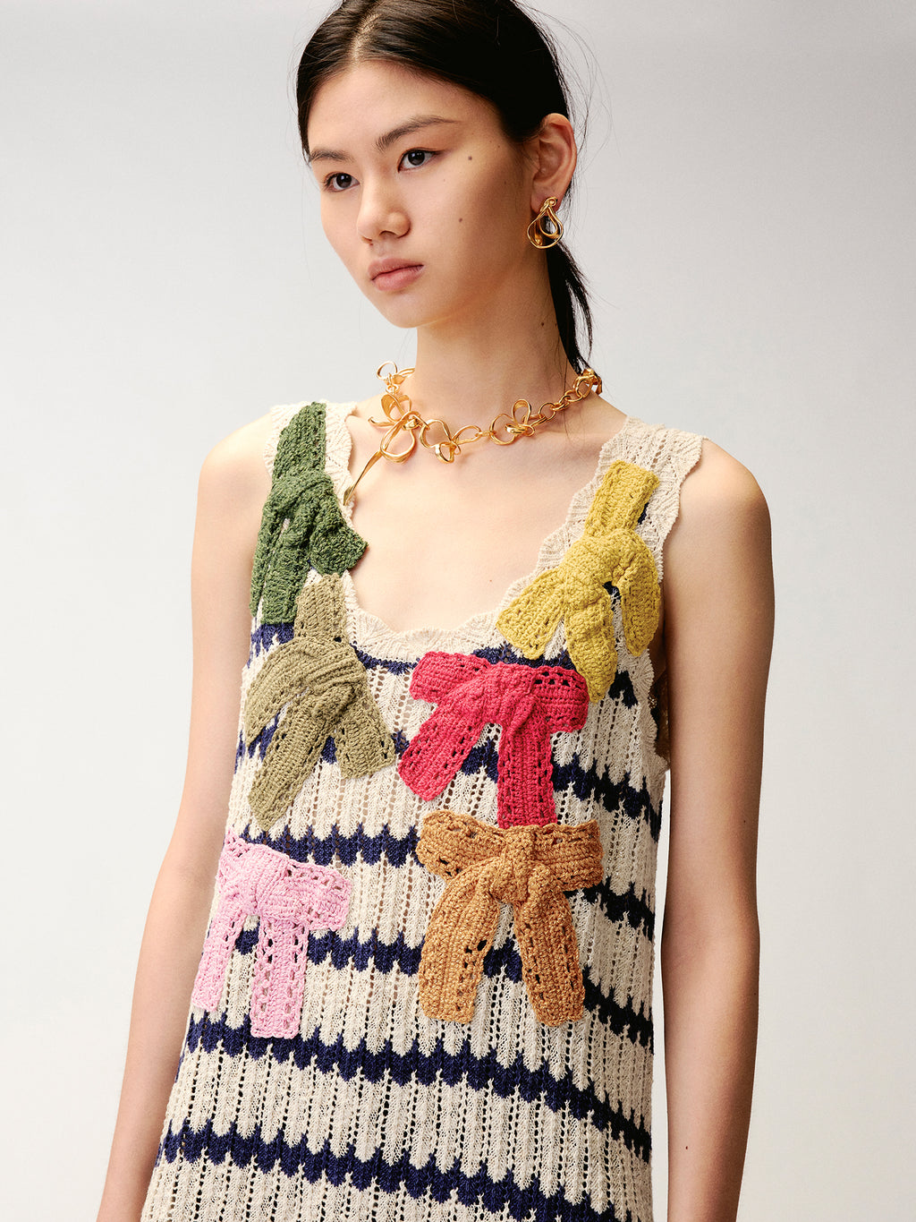 Hand-crocheted bow knit vest dress