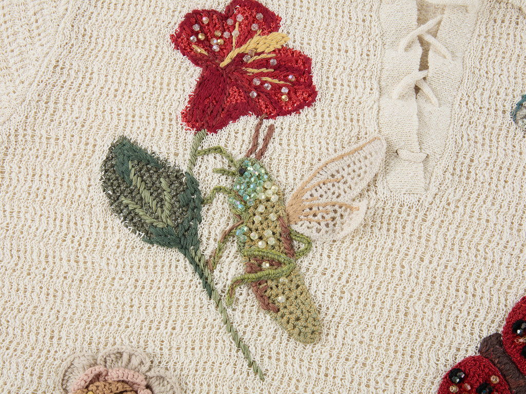 Hand-crocheted insect and floral tie-front polo knit shirt