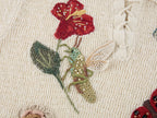 Hand-crocheted insect and floral tie-front polo knit shirt
