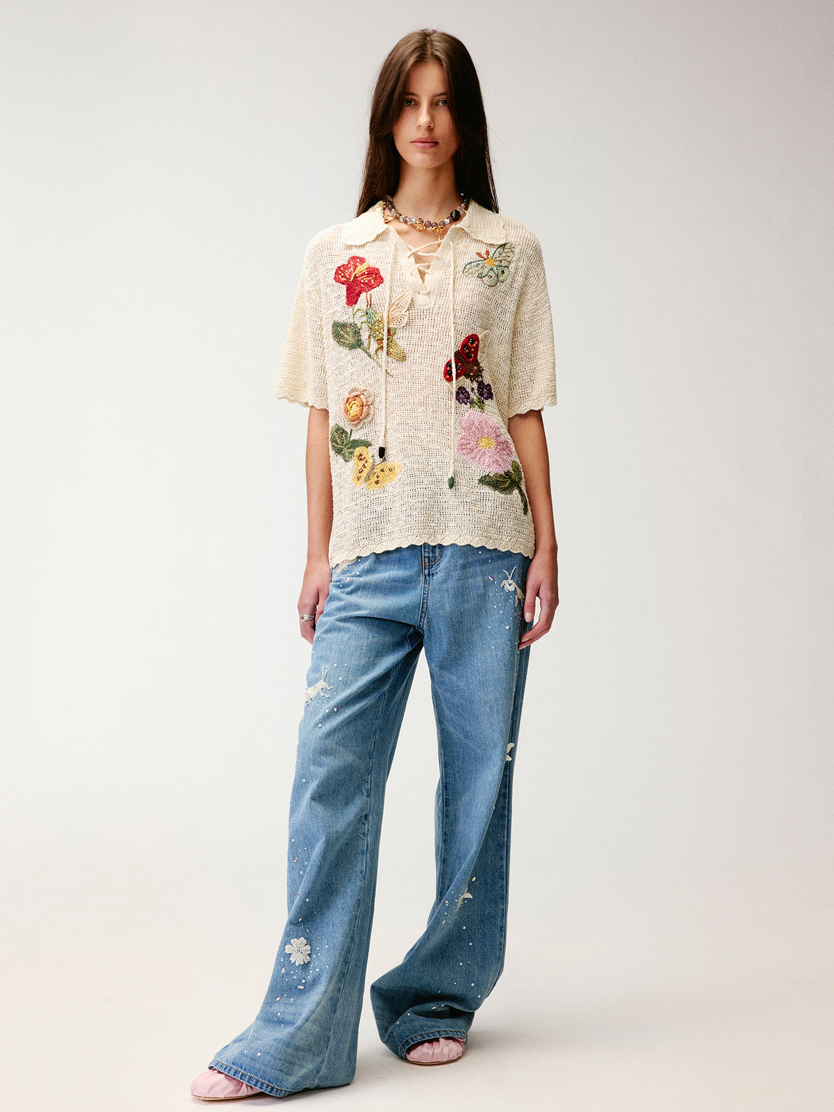 Hand-crocheted insect and floral tie-front polo knit shirt