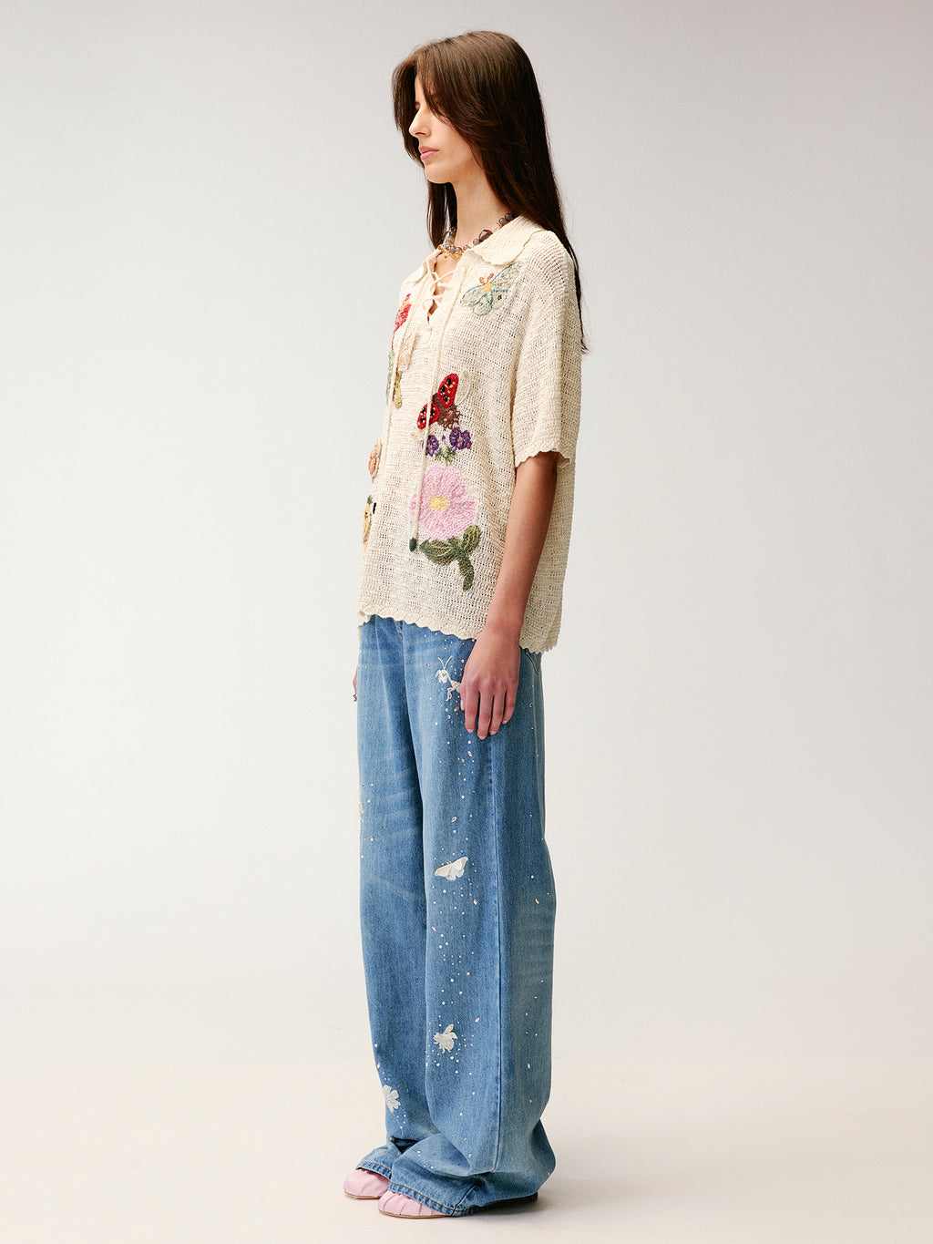 Hand-crocheted insect and floral tie-front polo knit shirt