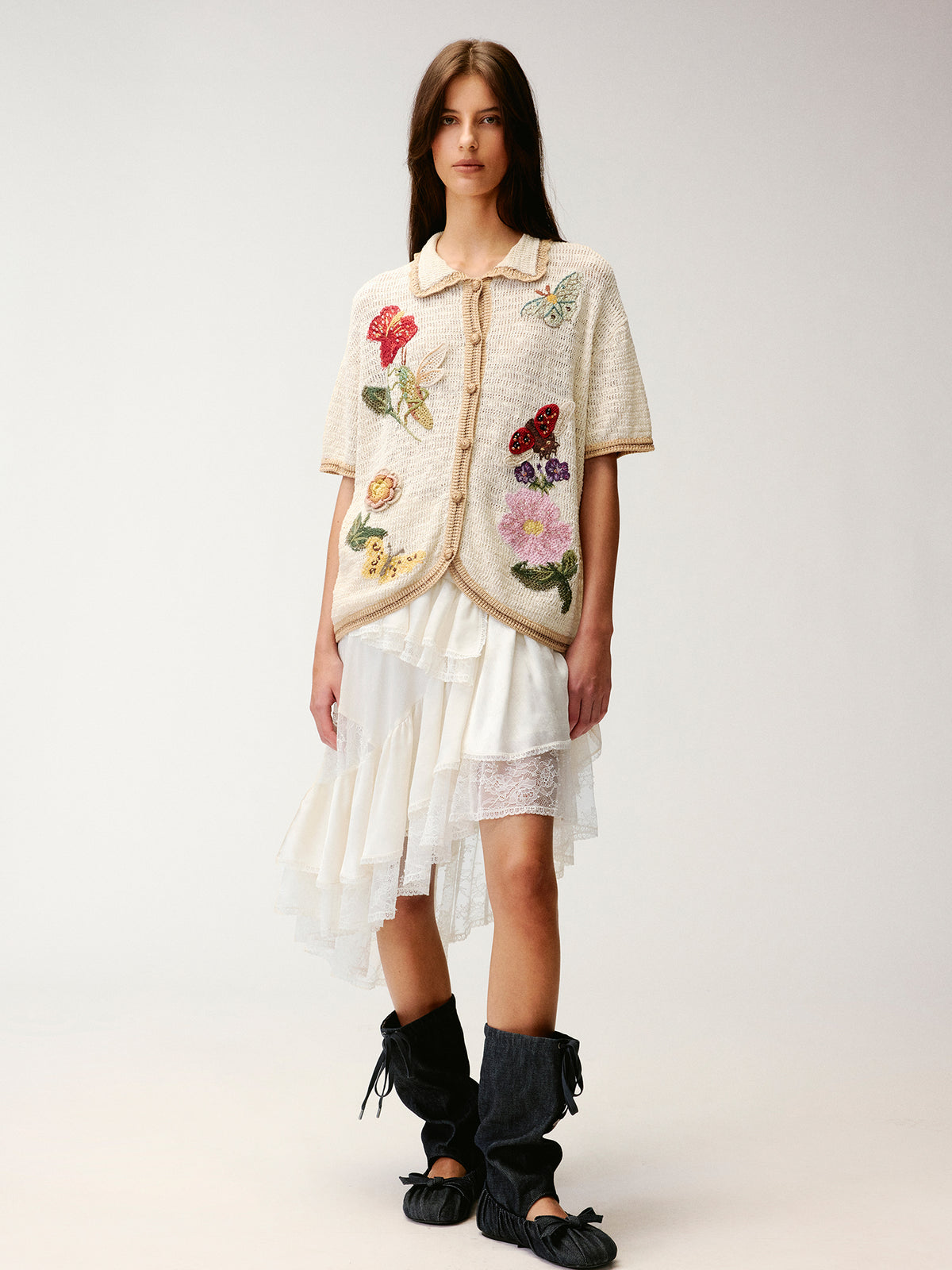 Hand-crocheted insect and floral cardigan