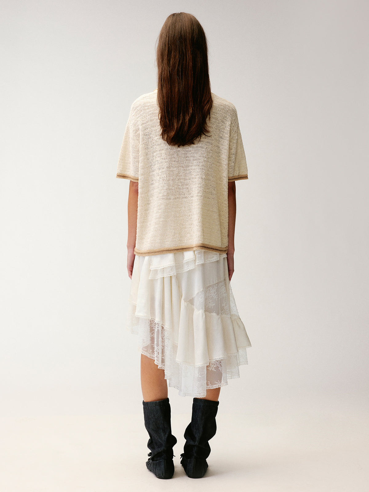 Hand-crocheted insect and floral cardigan