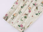 Insect and floral print curved pants