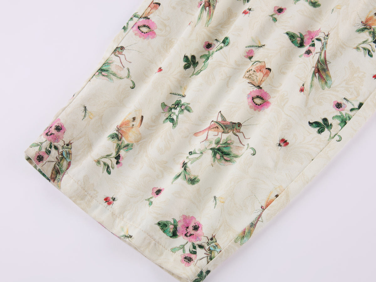 Insect and floral print curved pants