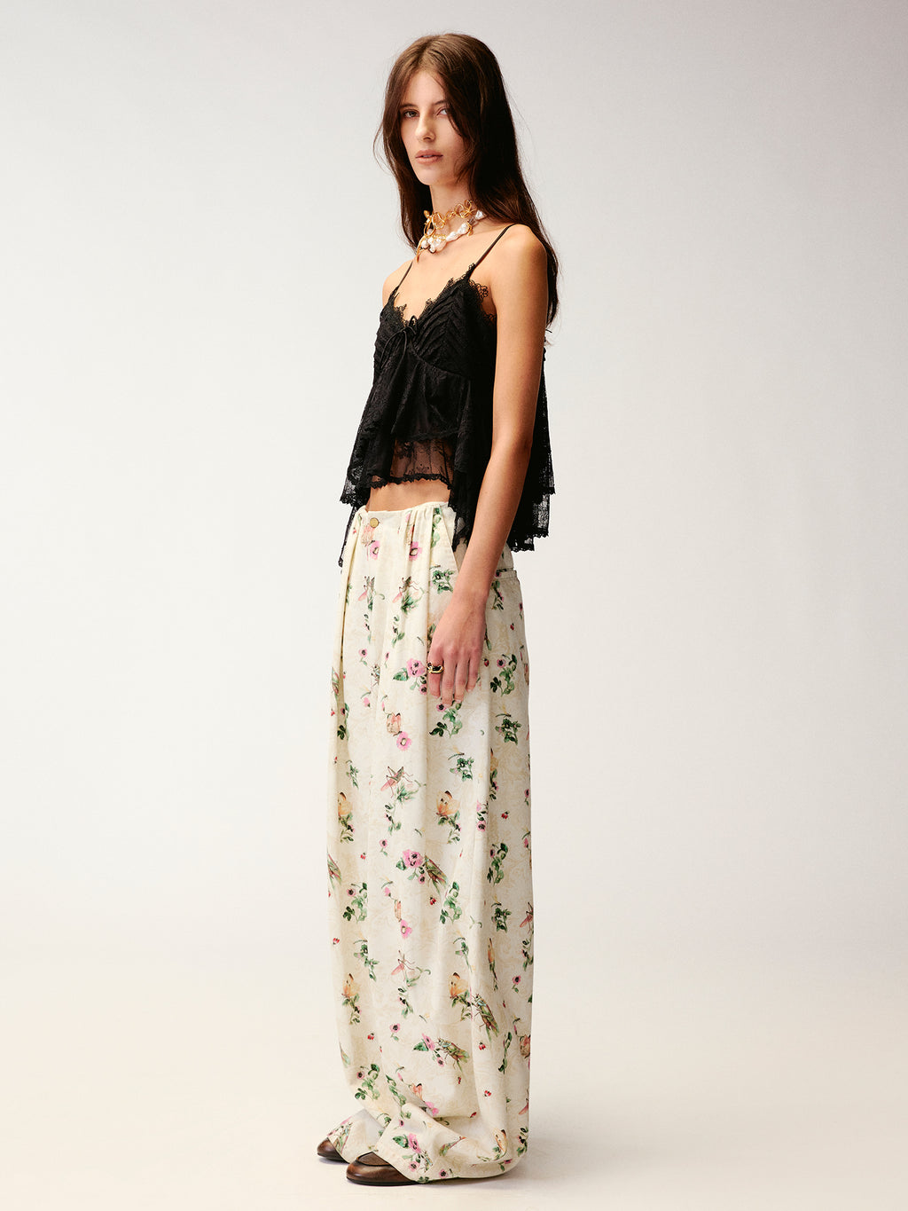 Insect and floral print curved pants