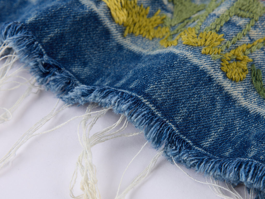 Insect and floral embroidered denim pants