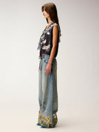 Insect and floral embroidered denim pants