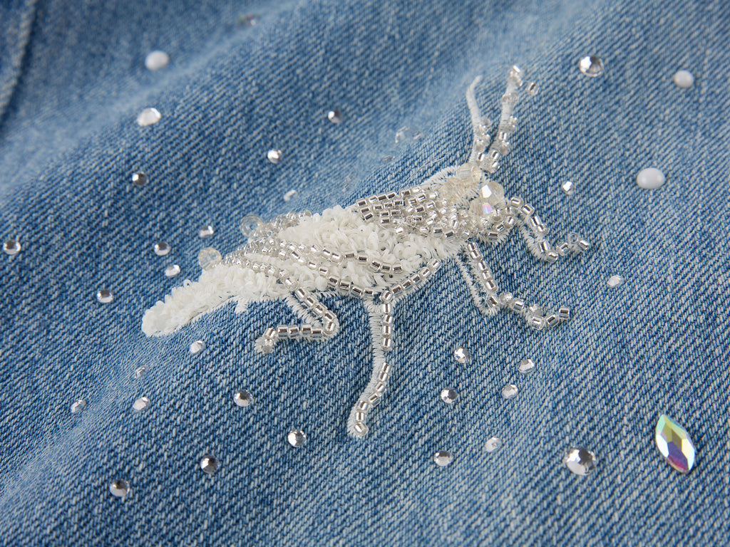 Insect-beaded rhinestone denim pants