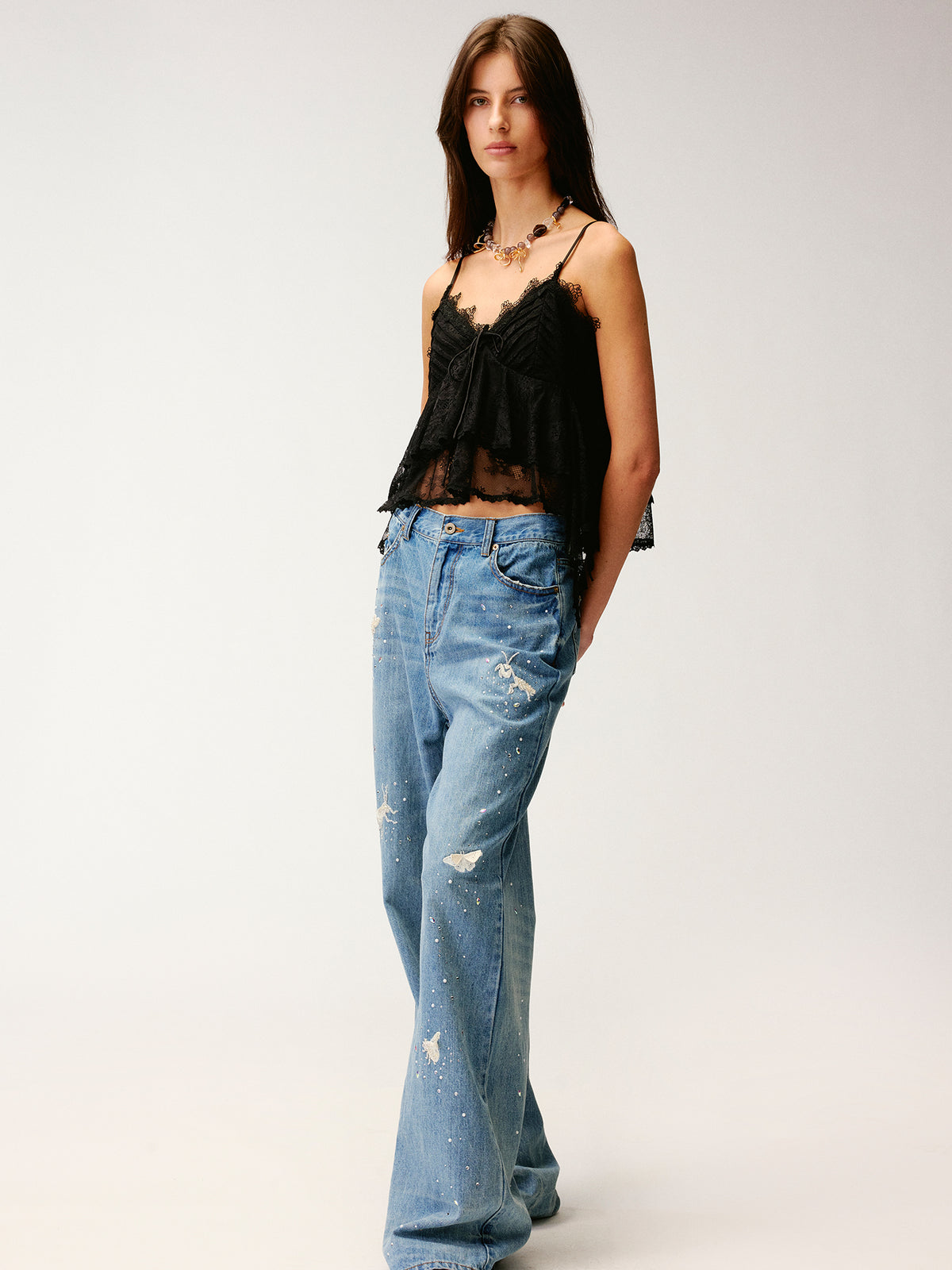 Insect-beaded rhinestone denim pants