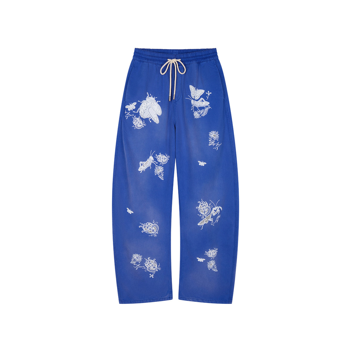 Lace insect and floral motif curved denim pants