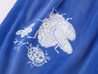 Lace insect and floral motif klein blue denim shorts