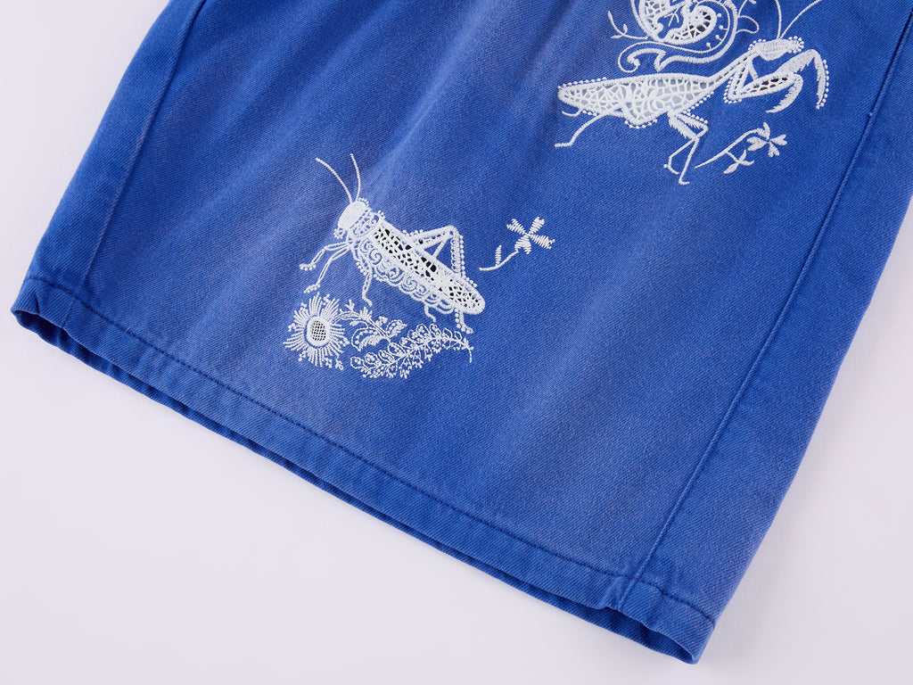 Lace insect and floral motif klein blue denim shorts