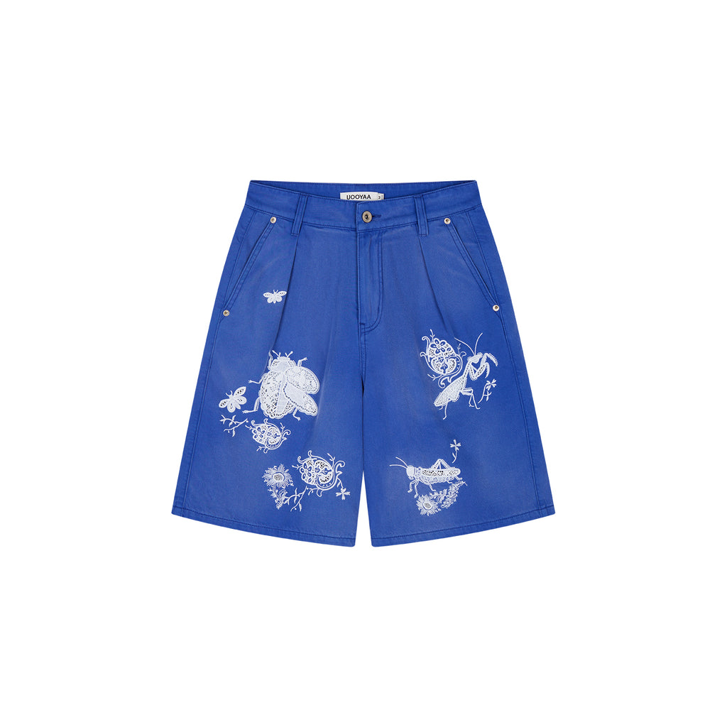 Lace insect and floral motif klein blue denim shorts