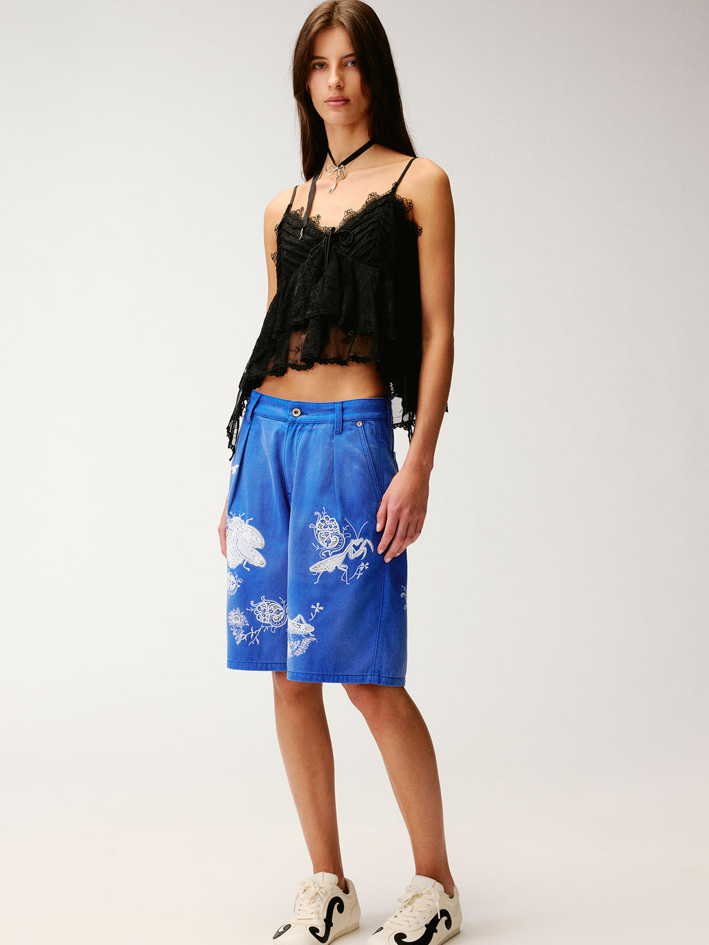 Lace insect and floral motif klein blue denim shorts