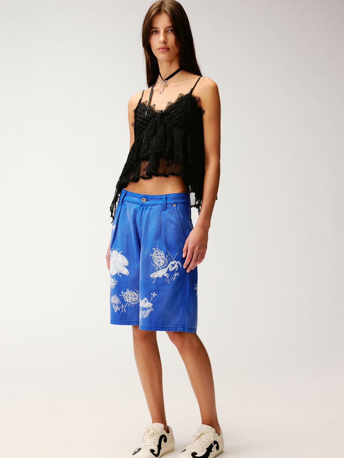 Lace insect and floral motif klein blue denim shorts