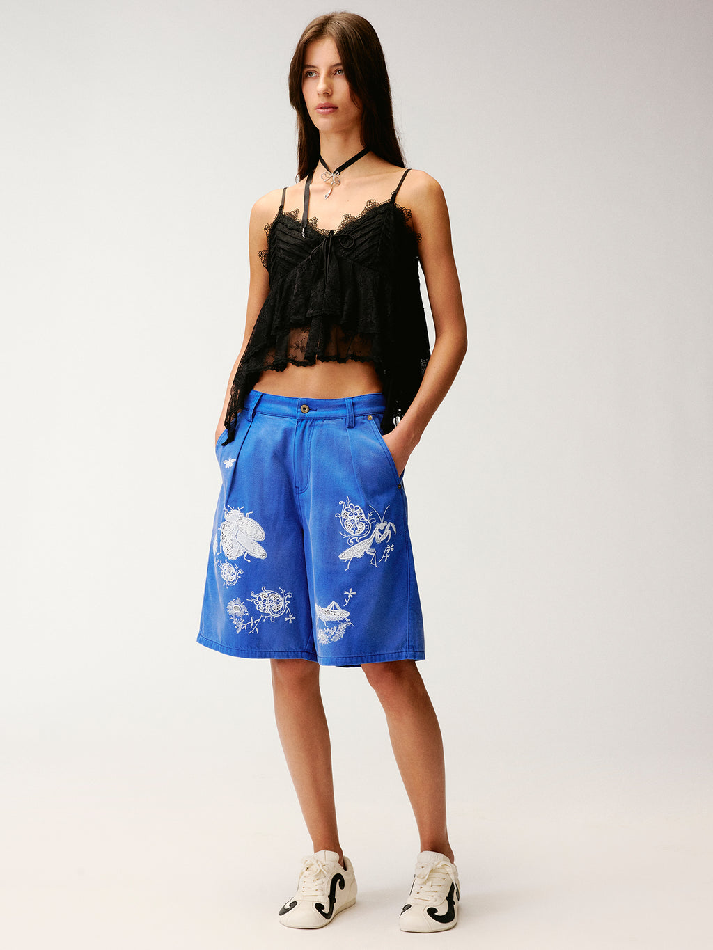 Lace insect and floral motif klein blue denim shorts