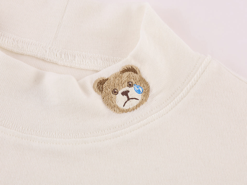 Petty Teddy Embroidered Mock Neck Top