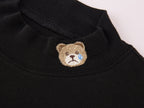 Petty Teddy Embroidered Mock Neck Top