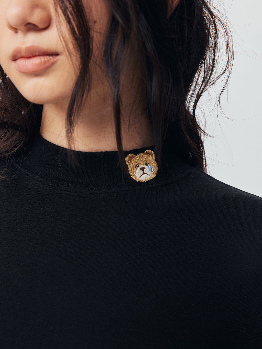 Petty Teddy Embroidered Mock Neck Top