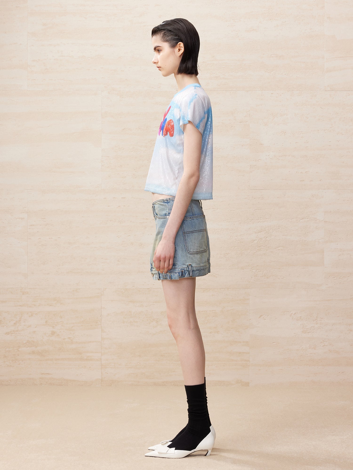 Deconstructed washed denim skirt