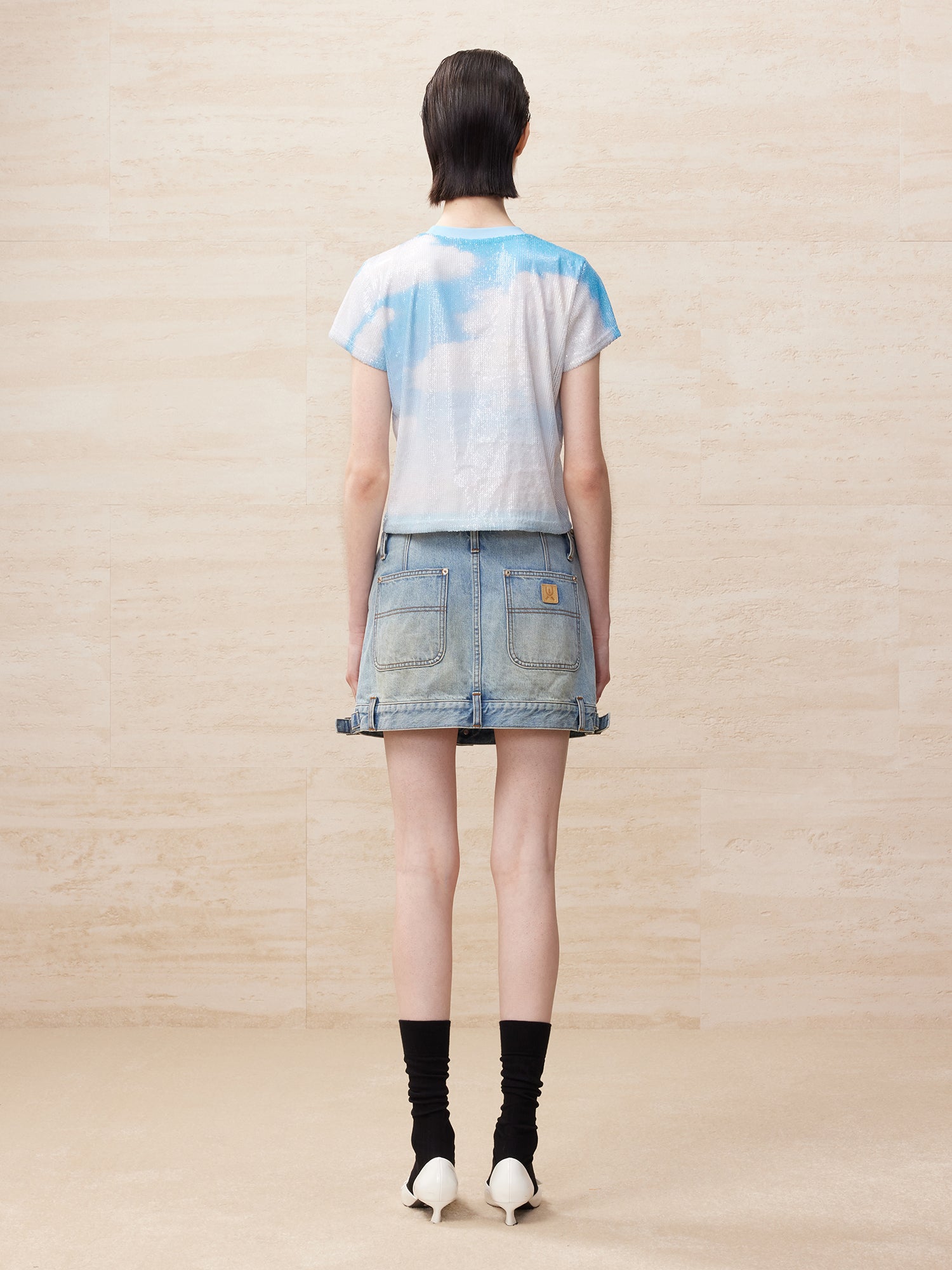 Deconstructed washed denim skirt