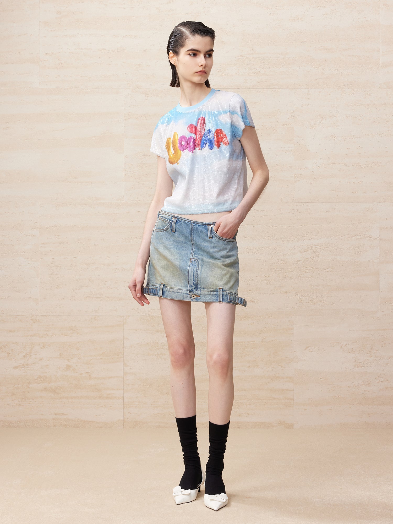 Deconstructed washed denim skirt